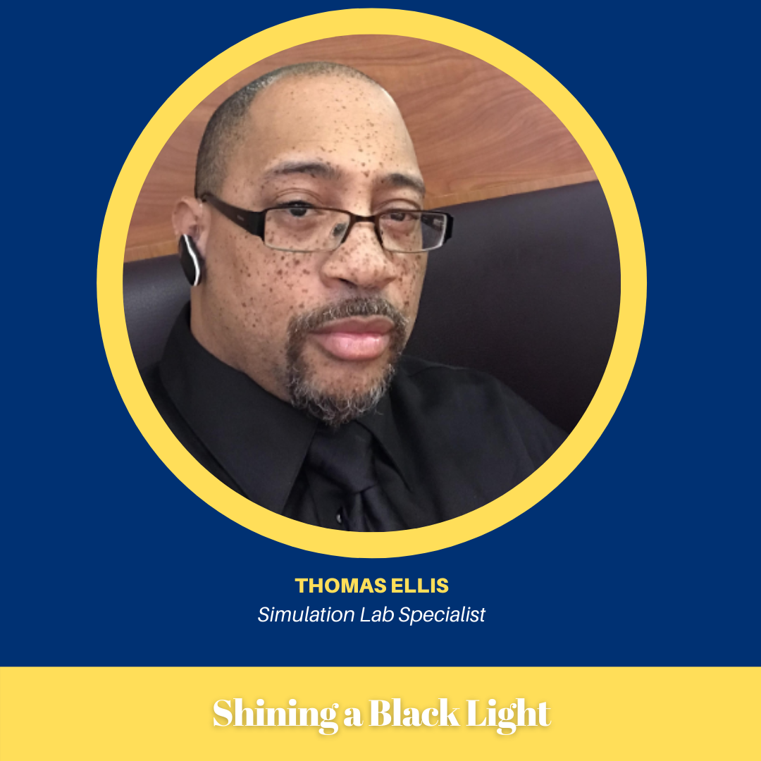 Thomas' headshot in a Shining a Black Light Frame